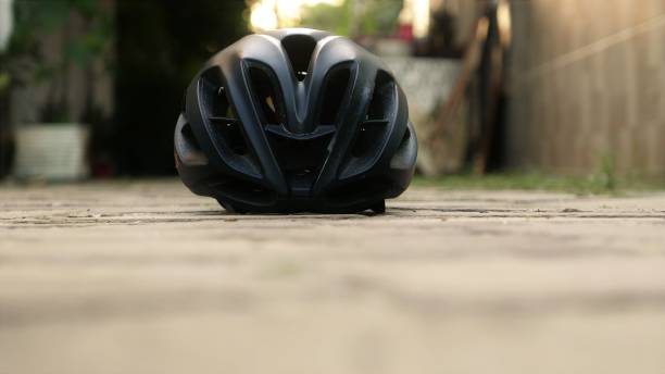 istock Cycling day: helmet close-up shot. A cyclist helmet. Bicycle day 1491435489