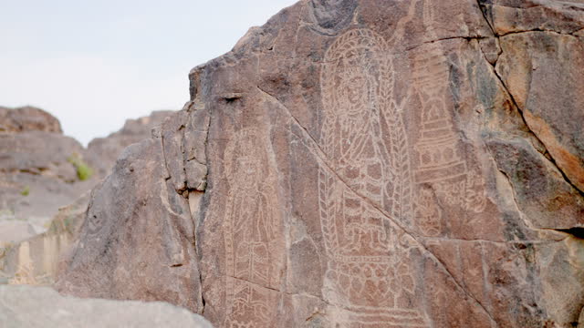 Thalpan Petroglyphs, Thousands of ancient rock carvings are scattered just off the highway located at Chilas, Pakistan