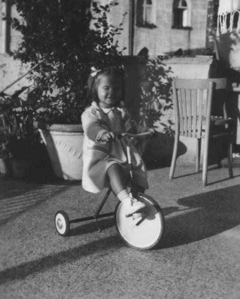 Baby girl cycling.