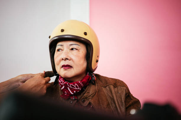 Vintage leather helmet and gloves on vintage motorcycle handlebars. Short depth of field. Shot with 5DII.