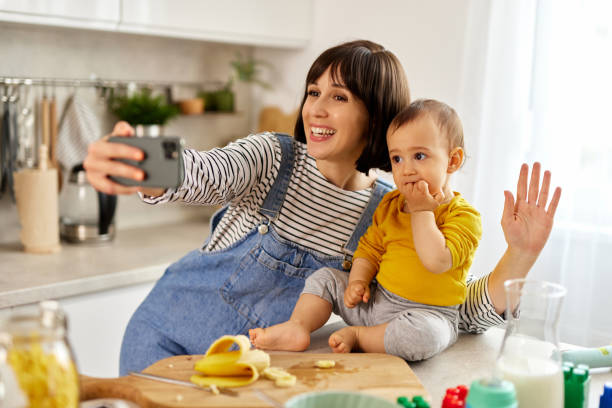 istock Mother taking Selfie with her baby boy in the kitchen 1491438883