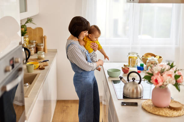 istock Mother and baby boy in the kitchen 1491439779