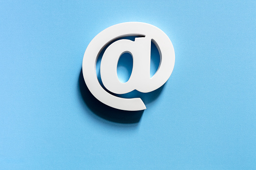 White email symbol on blue background concept for internet, contact us and e-mail address