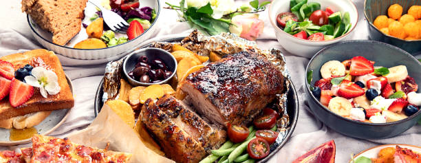 istock Family dinner or lunch. Many dishes on the table. 1491446319