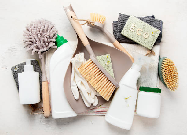 istock Eco brushes and cleaning products on light background.  Eco Cleaner concept. 1491446324