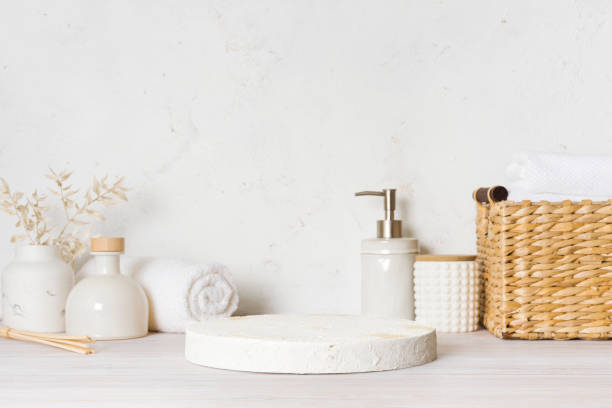 istock Spa concept with white rough texture pedestal for product display 1491447248