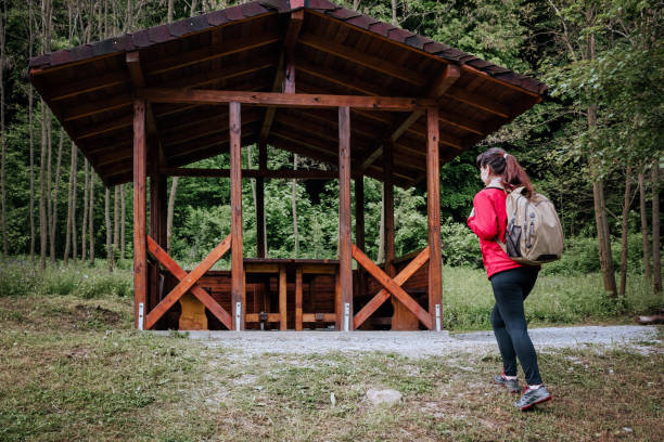 Mature woman hiking in natural parkland