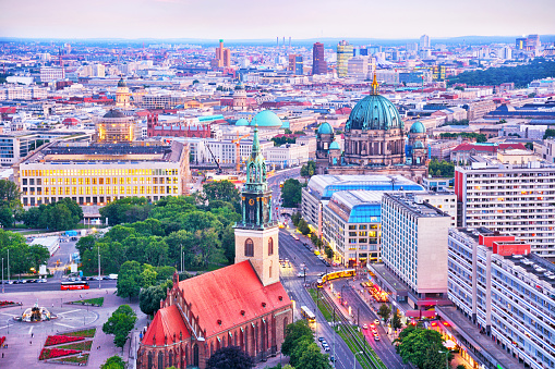 Berlin skyline with Berliner Dom and St. Mary's Church sunset, Germany