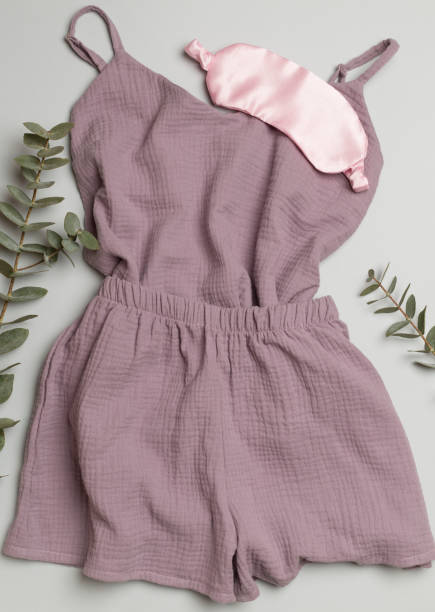 istock Flat lay composition with beautiful pajamas on color background, top view 1491451641