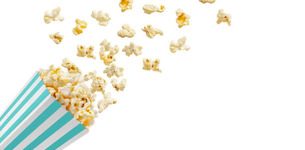 istock Popcorn flying out of turquoise white striped paper box, isolated on white background 1491451663