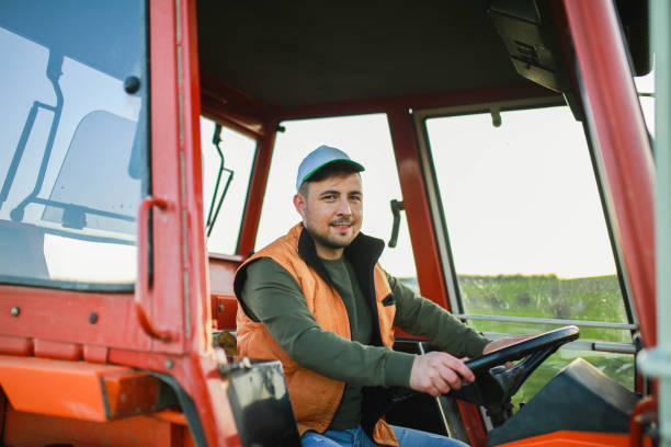 istock Young turkish farmer man drives tractor in field 1491452219