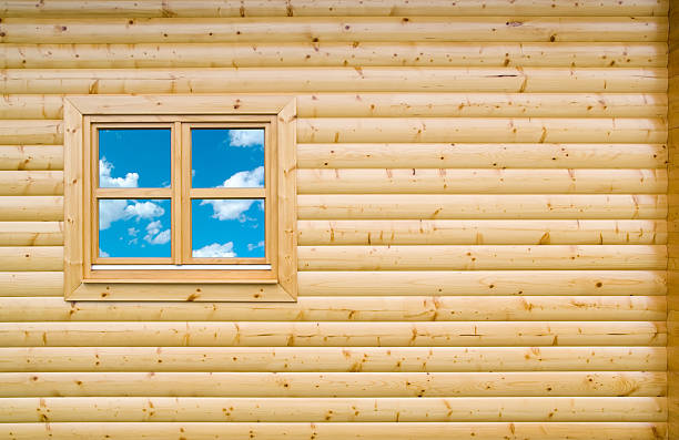 Hexagonal window with natural wood frame
