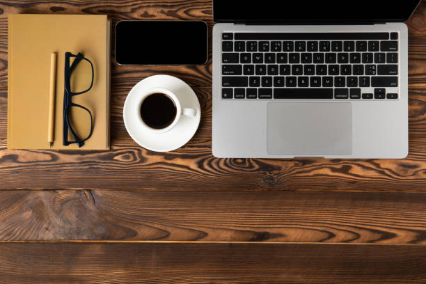 Free Stock Photo of Modern Workspace With Laptop, Cell Phone, and ...
