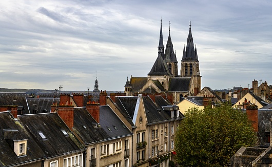 Blois, France, October 28, 2020: View of the St. Nicholas Church in this town on the Loire River on a cloudy autumn day. The Loire Valley is listed as UNESCO World Heritage Site.
