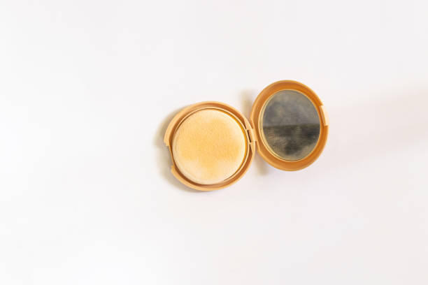 istock face powder with a mirror on a white background top view 1491464397