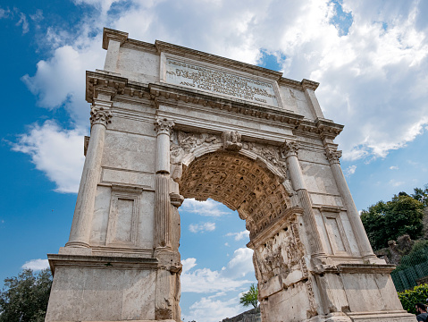 The iconic Arch of Titus on the Via Sacra in the Roman Forum.
