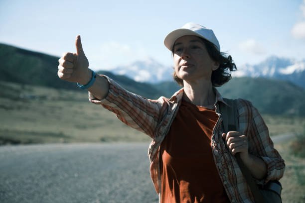 istock Woman is stopping the car 1491470357