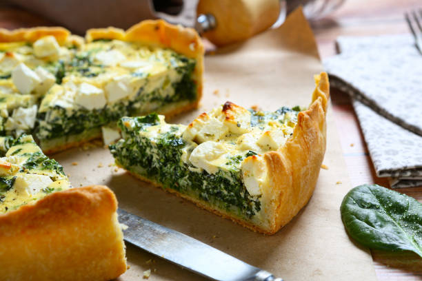 istock Piece of delicious spinach salmon pie 1491472574