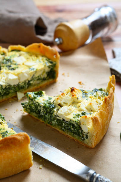 istock Sliced kale spinach feta pie on a napkin 1491472576