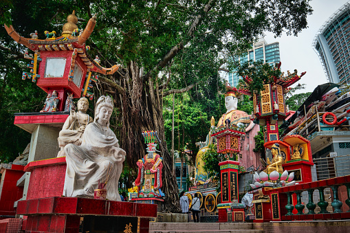 Hong Kong SAR, China - April 2023:Kwan Yin (Guan Yin) Shrine in Tin Hau Temple Colorful God statues at the Repulse Bay is a quaint Taoist temple which is popular for its colorful mosaics