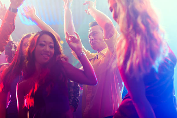 istock Party people dancing in disco or club 149147561