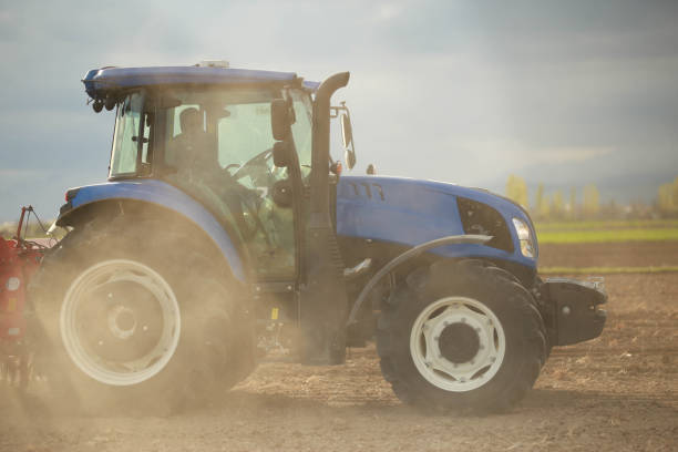 istock tractor planting seeds in the field 1491475699