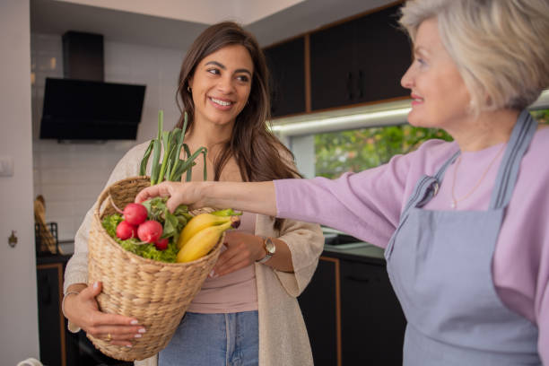 istock Volunteer is helping an elderly woman 1491475734
