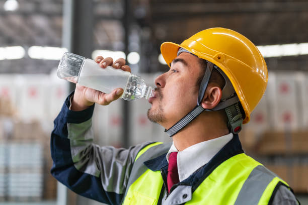 istock Asian Male Warehouse worker drinking water 1491477294