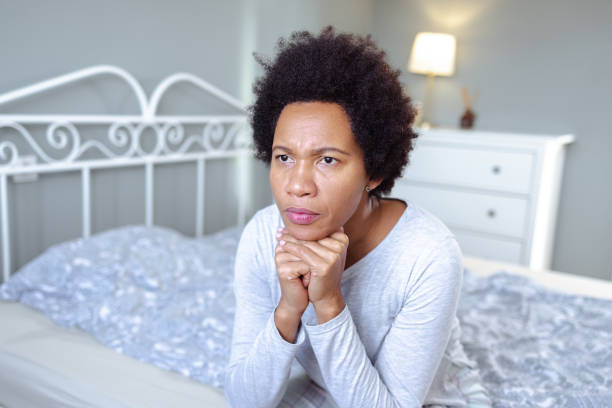 istock Unhappy African-American woman suffering from depression 1491477501