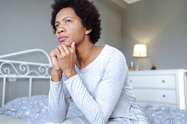 istock Unhappy African-American woman suffering from depression 1491477575