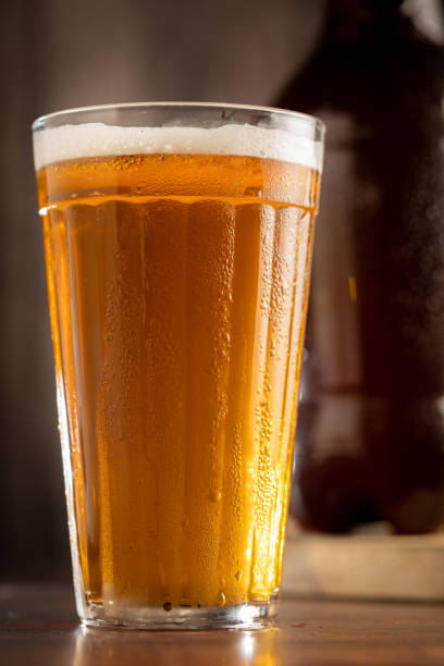 cold mug of amber lager craft beer. - amber beer imagens e fotografias de stock