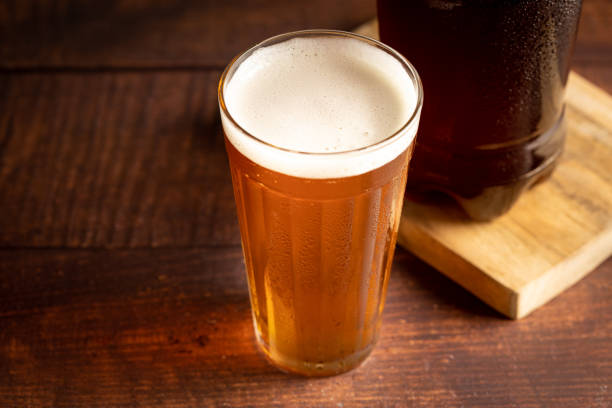 cold mug of amber lager craft beer. - amber beer imagens e fotografias de stock