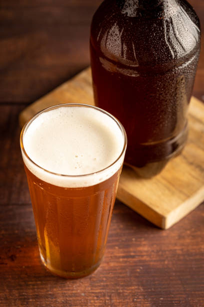 cold mug of amber lager craft beer. - amber beer imagens e fotografias de stock