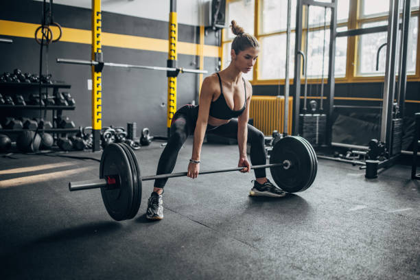 istock Woman weightlifting 1491479705