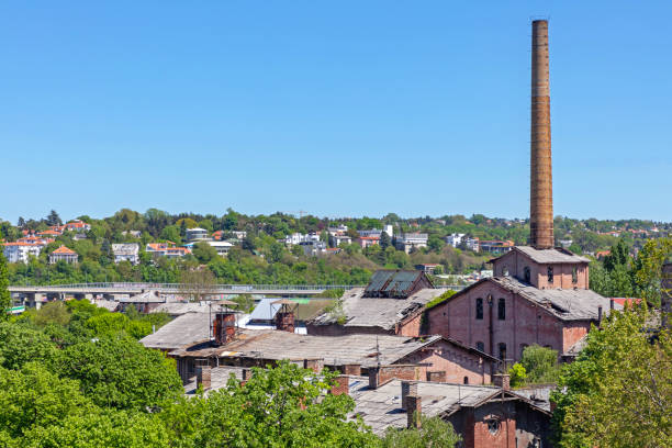 Tall Bricks Chimney at Abandoned Factory Old Industrial Complex