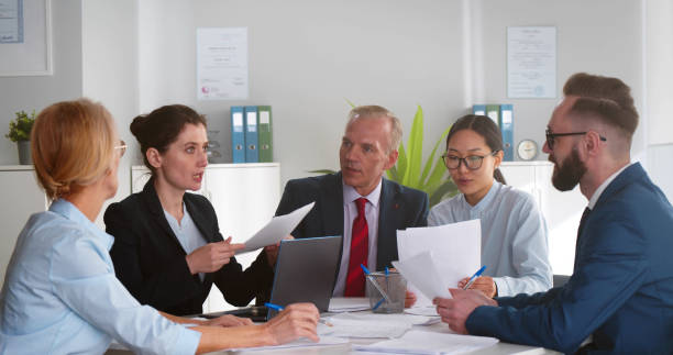 istock Businesspeople meeting in modern boardroom discussing startup project 1491481952