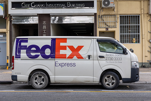 Hong Kong - May 19, 2023 : FedEx Express van in To Kwa Wan, Kowloon, Hong Kong.