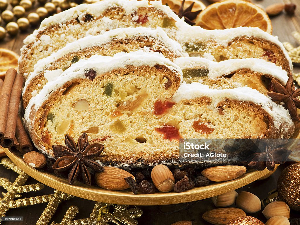 stud Traditional homemade stollen with dried fruits and nuts. Shallow dof. Almond Stock Photo