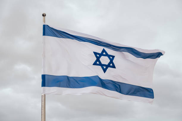 istock Israeli Flag. Cloudy day 1491484983