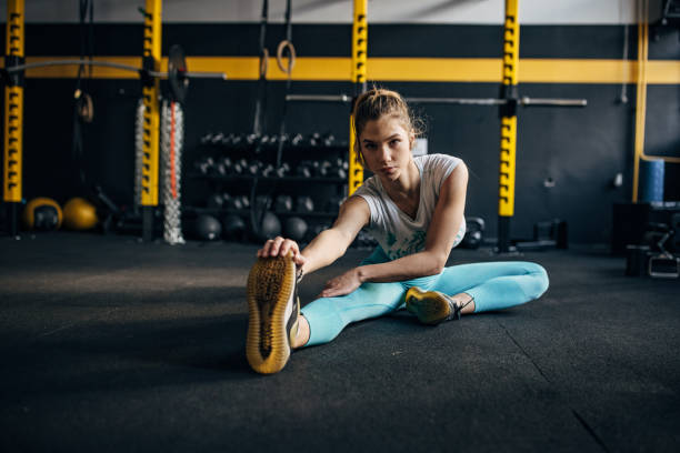 istock Fit woman exercising in gym 1491489298