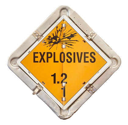 Metal explosives sign with orange warning label isolated on a white background