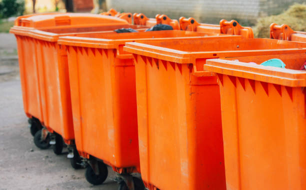 istock Oramge garbage cans in the city 1491493219