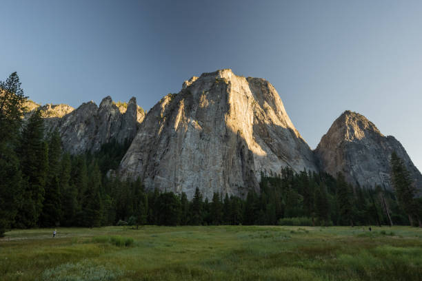 istock Cathedral Rocks Catch Morning Light Over El Capitan Meadow 1491493307