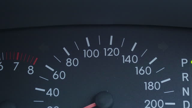 4k Sedan car emergency light on black dashboard