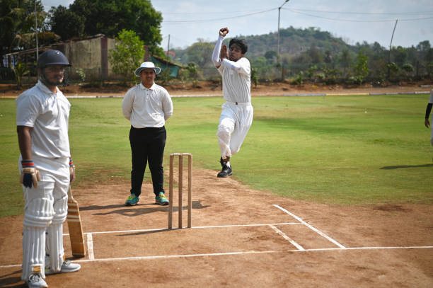 istock Fast pace bowler bowling in a cricket match 1491495158
