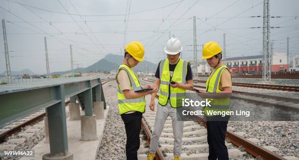 Railroad Workers Silent Devotees Of Rail Transport Stock Photo - Download Image Now