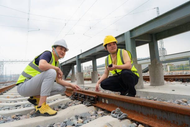 istock Two railway workers are inspecting the tracks 1491504284