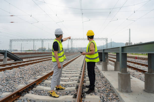 istock Two railway workers are inspecting the tracks 1491504389