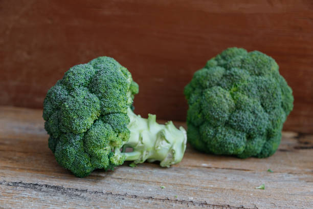 istock Broccoli on wood. Space for text. Top view. Healthy concept. 1491512764