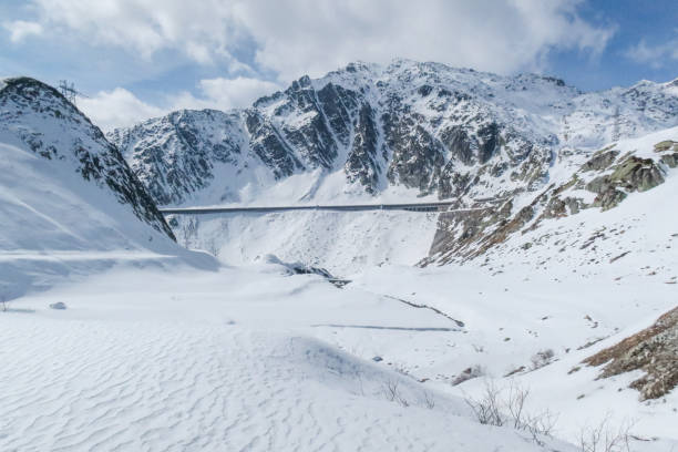 The top of the pass, clouds, covered with snow